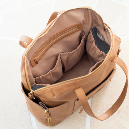 Milaloo diaper bag backpack worn on the shoulders