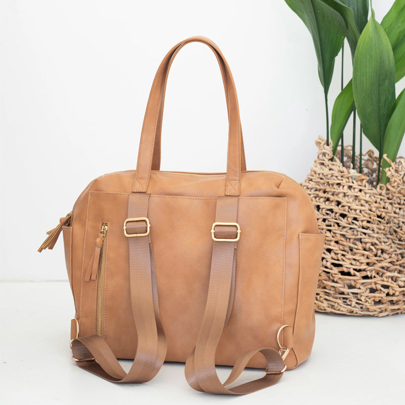 Inside the Milaloo diaper bag, showing the bottle pocket
